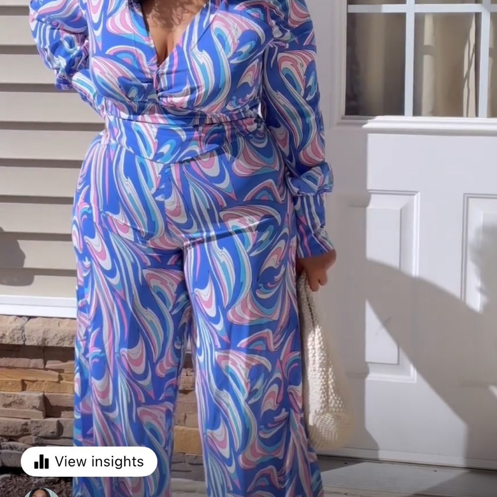 colorful wide leg jump suit. zipper in bag